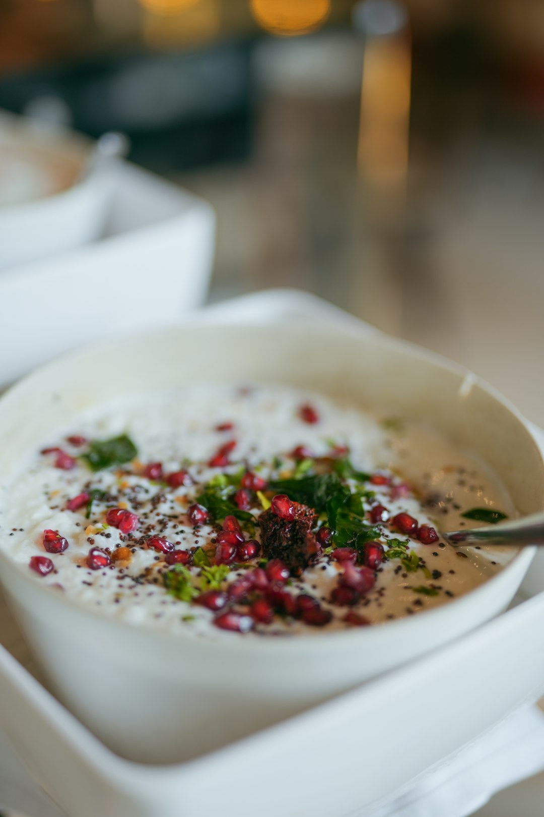a-bowl-of-soup-with-a-spoon-in-it-hwx0alu-zqi